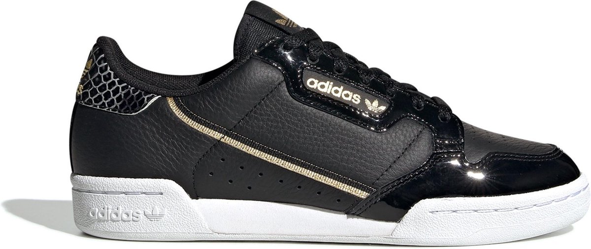 sneaker, zwart, leer, witte zool, gouden accenten