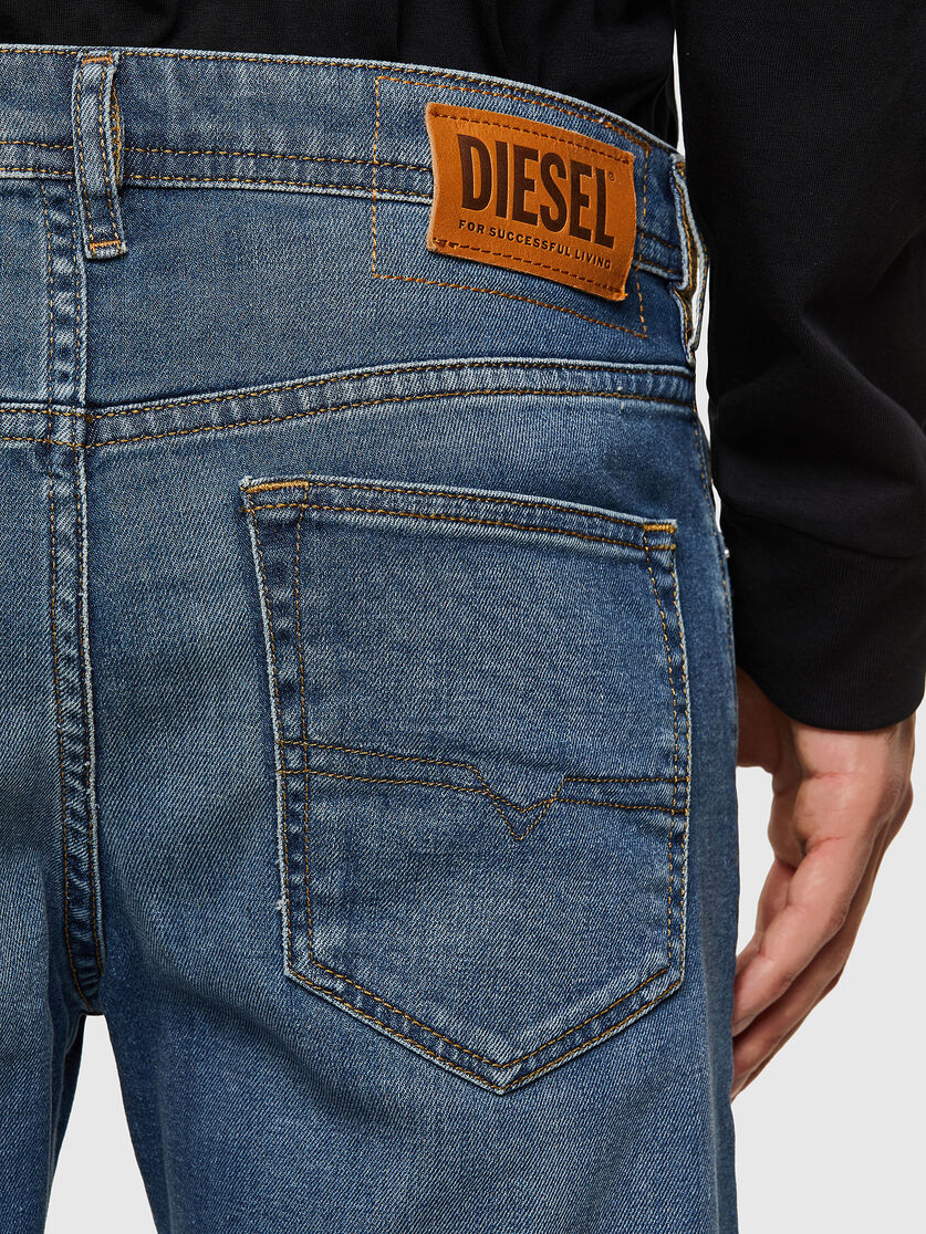 Diesel Duster heren jeans 009EI taps toelopend - W27-L32 - midden blauw