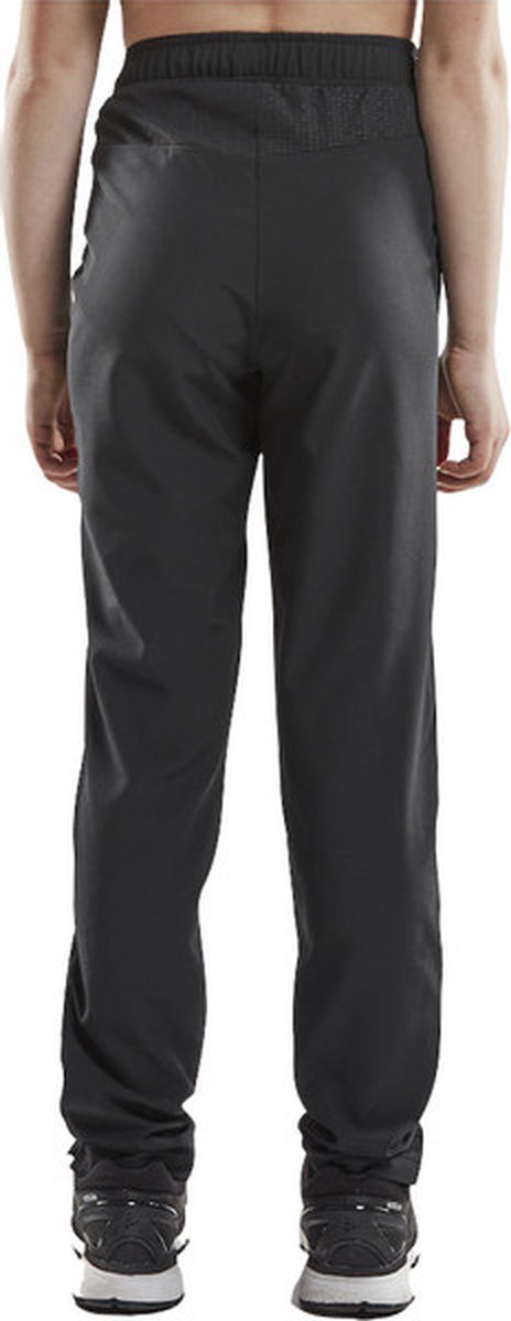 Craft Rush Wind Pants kinderen - 134/140 - Sportbroeken - zwart - Unisex