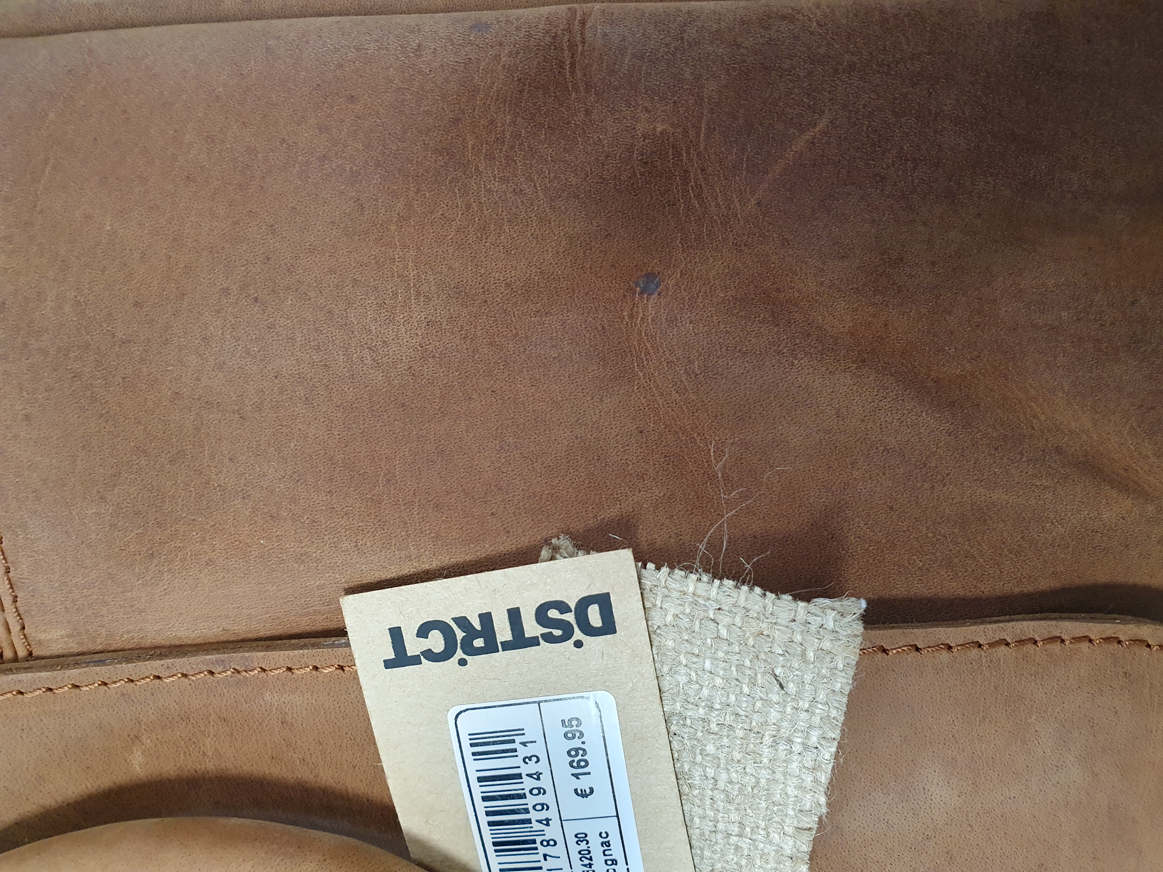 leder, bruin, leren bekleding, zachte textuur, stikseldetail